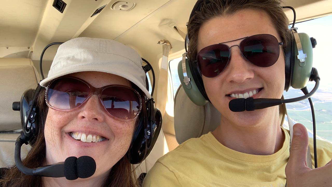 Michael Tet giving mom a flight after he passed his checkride